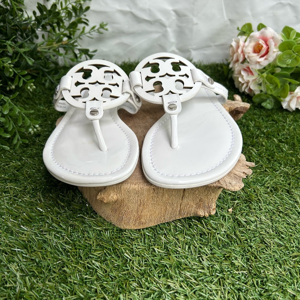 Tory Burch 
Miller cut-out leather flip-flops
$267 Sandals Sz 59 optical white - Picture 6 of 16